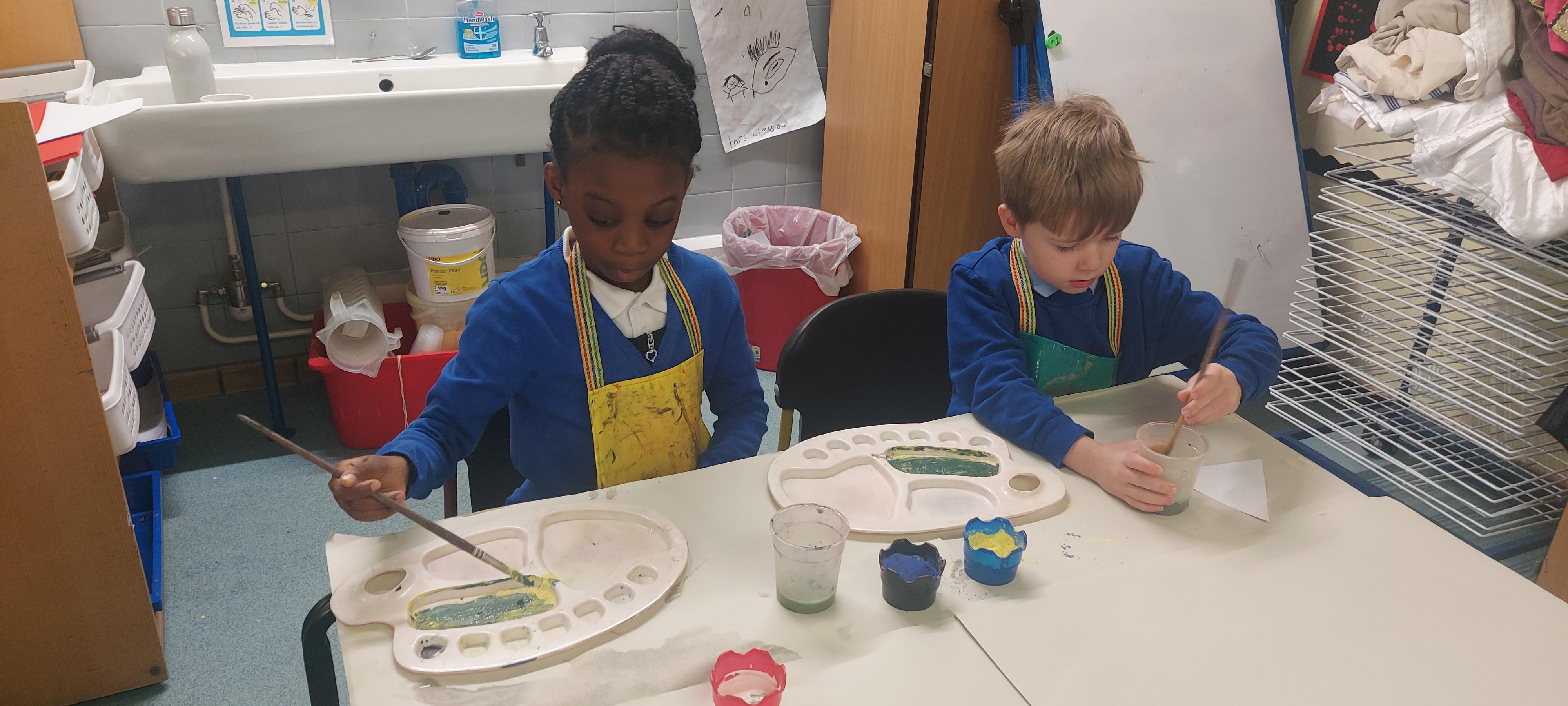 We have been using paint to mix different shades of green.